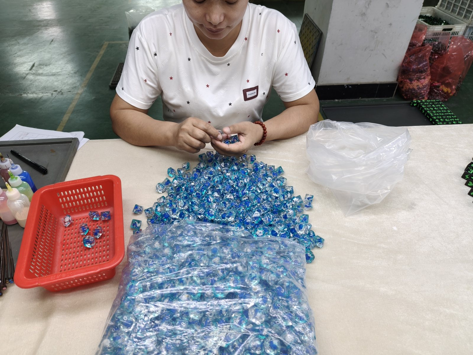 Final face-by-face inspection at the YSDICE QC bench before shipment